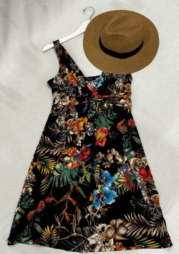 Floral print dress with straw hat.