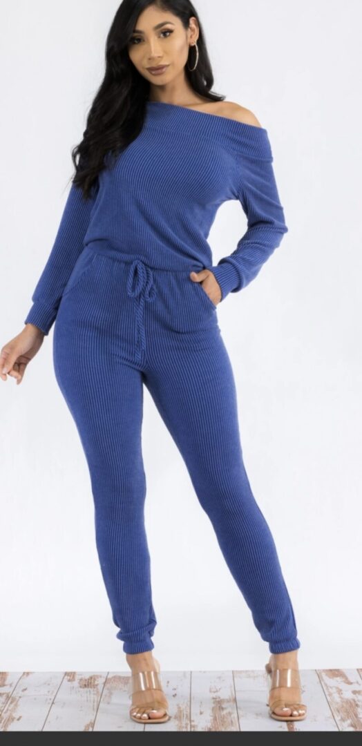 Blue one-shoulder jumpsuit with drawstring waist.